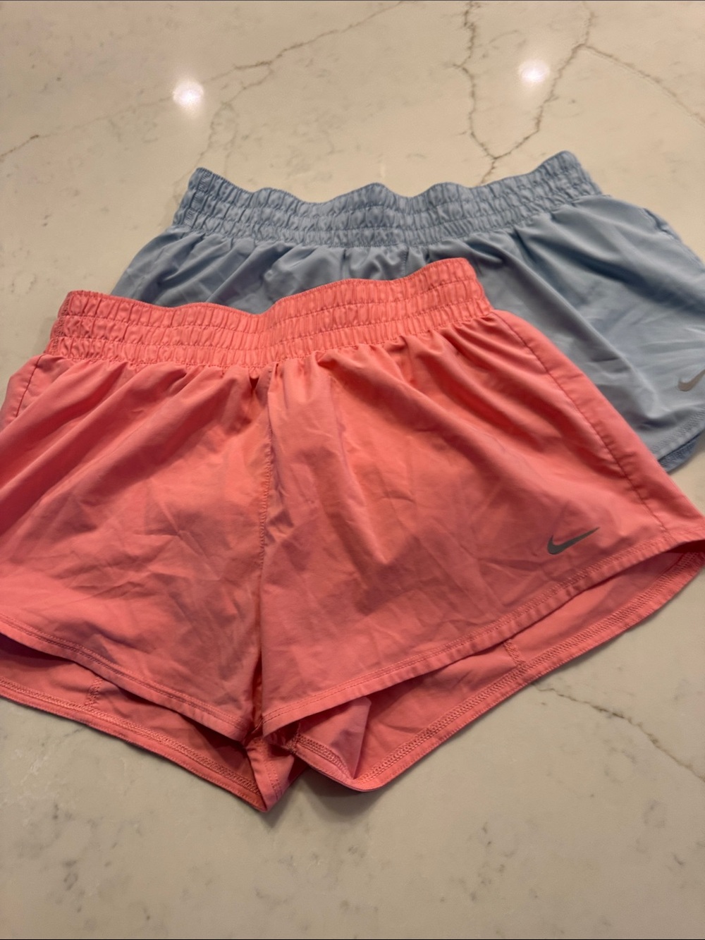 Nike Women's Dual-Pair Athletic Shorts in Coral Pink and Light Blue